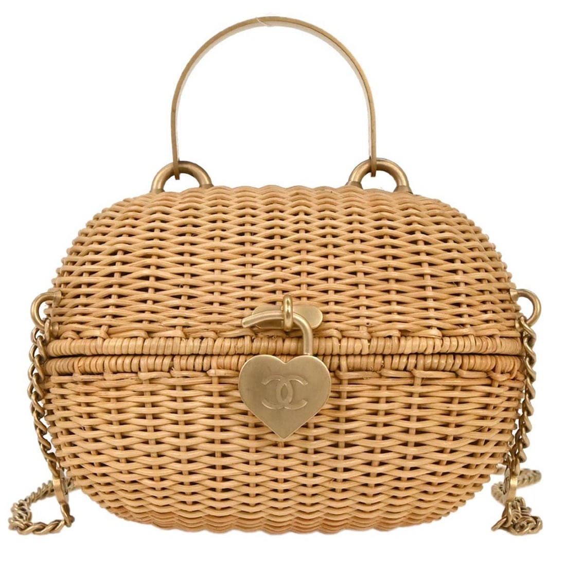 Chanel Beige Rattan Heart Lock 2way Handbag with Gold Accents: Chanel Beige Rattan Heart Lock 2way Handbag with Gold Accents This Chanel handbag is a stylish blend of functionality and elegance. Crafted from rattan, it features a chic beige exterior complemented 