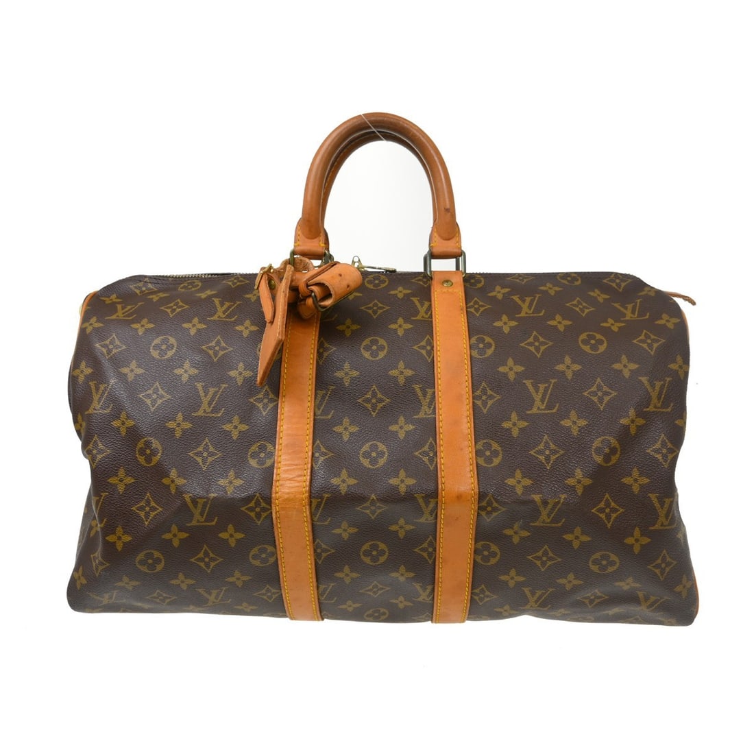 Louis Vuitton Keepall Monogram Canvas Travel Bag: Louis Vuitton Keepall Monogram Canvas Travel Bag This Louis Vuitton Keepall Bag features the iconic Monogram canvas in a classic brown color. Designed for unisex use, it offers ample space and versati
