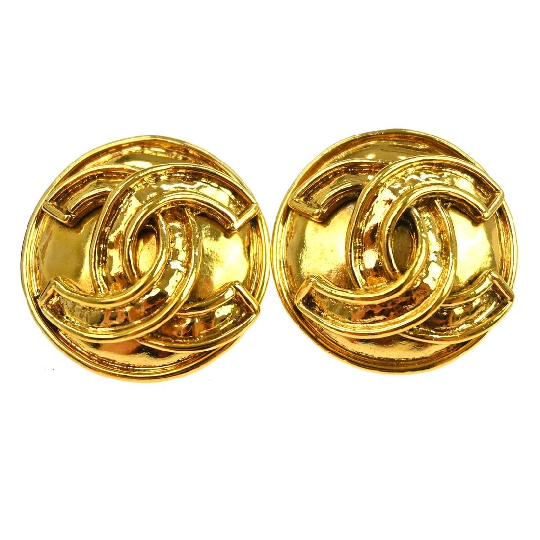 Chanel Gold Tone Logo Button Clip-On Earrings: Chanel Gold Tone Logo Button Clip-On Earrings These Chanel button-shaped clip-on earrings feature a gold-tone metal finish and showcase the iconic logo design. Made in France, they offer a stylish and