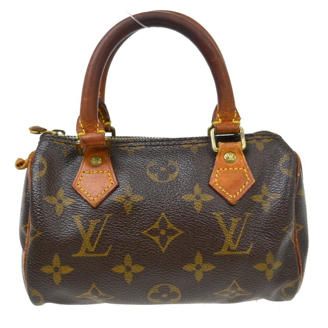 Louis Vuitton Speedy Mini Monogram Canvas Zip Handbag: Louis Vuitton Speedy Mini Monogram Canvas Zip Handbag This Louis Vuitton Mini Speedy handbag features the iconic monogram pattern on brown monogram canvas leather. Designed in a compact mini size, it 