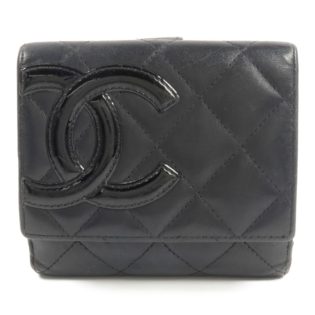 Chanel Cambon tri fold calfskin wallet black pink: Chanel Cambon tri fold calfskin wallet black pink This CHANEL Cambon tri-fold wallet is crafted from calfskin leather in a striking black and pink color combination. Designed for women, it features th