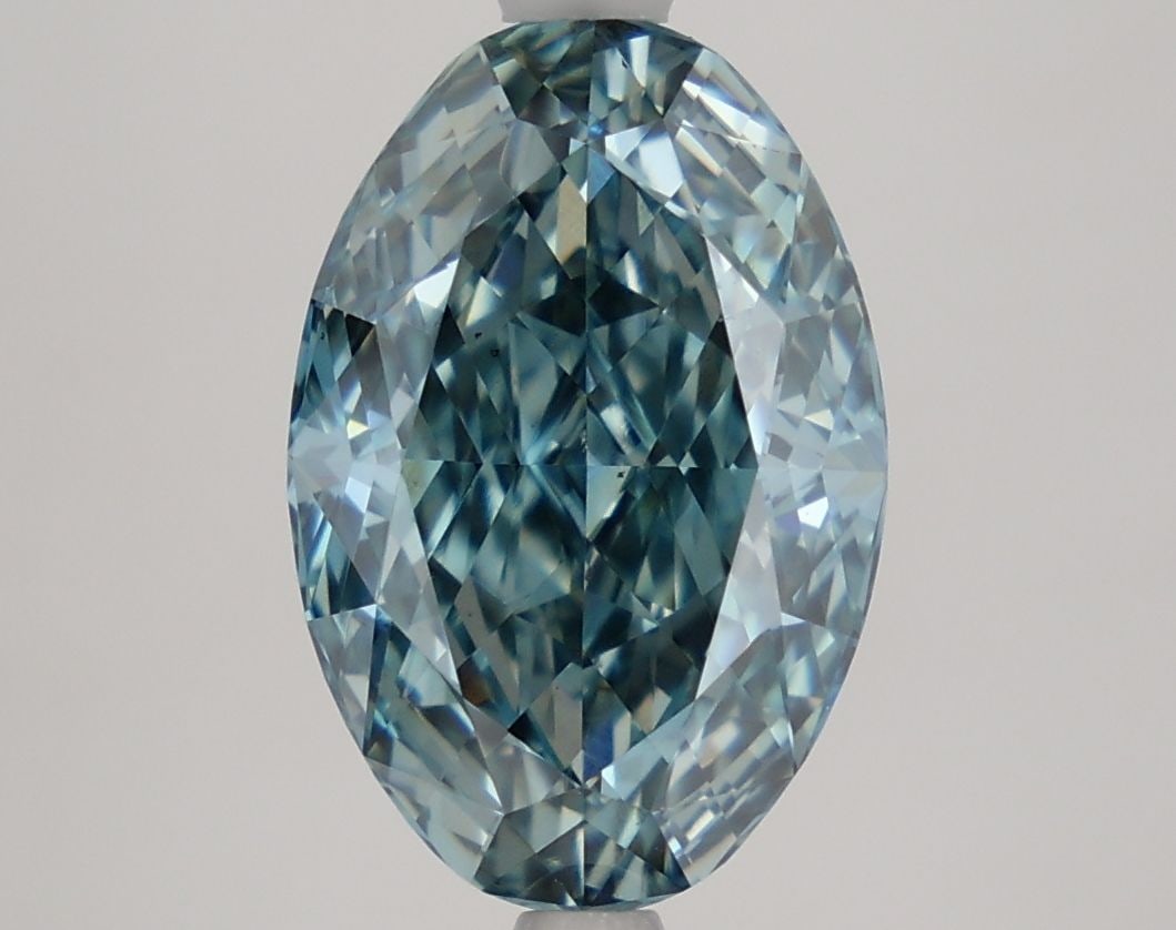 Loose Diamond - OVAL 3.73ct Fancy Vivid Blue VS2: Loose Diamond - OVAL 3.73ct Fancy Vivid Blue VS2 Source: This is a real non-mined Diamond that has been grown in a lab Shape: OVAL Carats: 3.73 Color: Fancy Vivid Blue Certification: NONE Video: