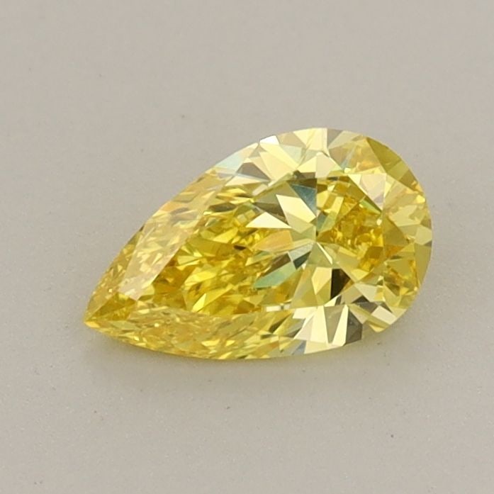 Loose Diamond - PEAR 0.46ct Fancy Vivid Yellow VS1: Loose Diamond - PEAR 0.46ct Fancy Vivid Yellow VS1 Source: This is a real non-mined Diamond that has been grown in a lab Shape: PEAR Carats: 0.46 Color: Fancy Vivid Yellow Certification: IGI Video: