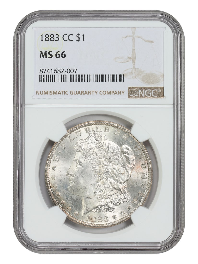 1883 Carson City Morgan Dollar NGC MS66: 1883 Carson City Morgan Dollar NGC MS66 This is an 1883-CC Morgan Dollar graded MS66 by NGC. Struck at the Carson City Mint, this uncirculated silver dollar is a well-known example from the popular CC