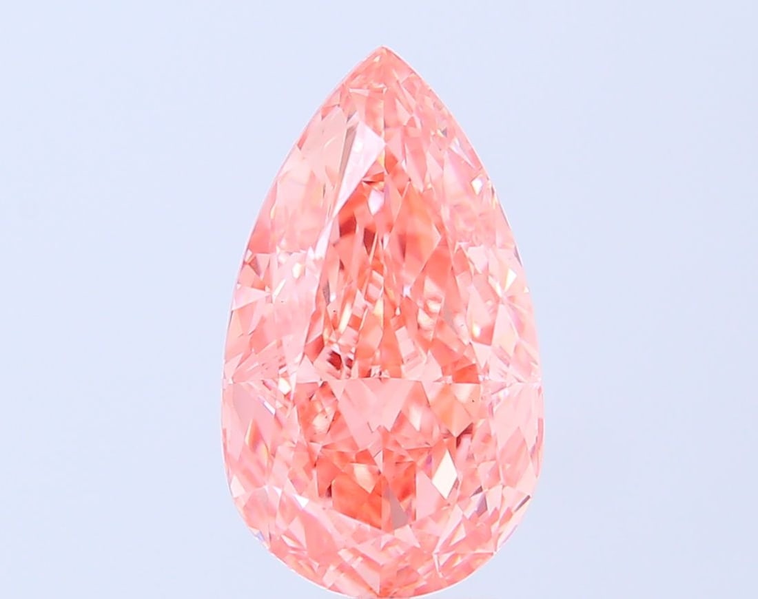 Loose Diamond - PEAR 4.6ct Fancy Vivid Orangey Pink VS1: Loose Diamond - PEAR 4.6ct Fancy Vivid Orangey Pink VS1 Source: This is a real non-mined Diamond that has been grown in a lab Shape: PEAR Carats: 4.6 Color: Fancy Vivid Orangey Pink Certification: