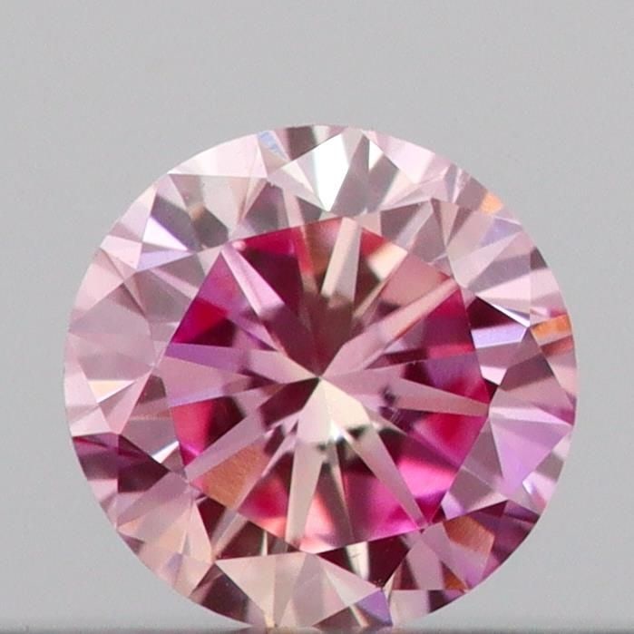 Loose Diamond - ROUND 0.13ct Fancy Vivid Pink VS1: Loose Diamond - ROUND 0.13ct Fancy Vivid Pink VS1 Source: This is a real non-mined Diamond that has been grown in a lab Shape: ROUND Carats: 0.13 Color: Fancy Vivid Pink Certification: IGI Video: