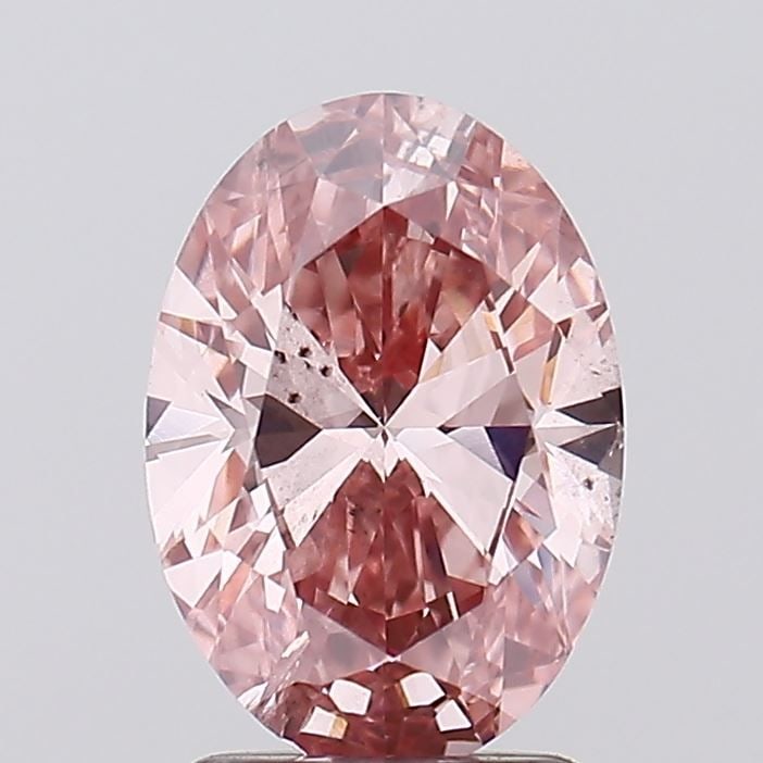 Loose Diamond - OVAL 2.0ct Fancy Vivid Pink SI2: Loose Diamond - OVAL 2.0ct Fancy Vivid Pink SI2 Source: This is a real non-mined Diamond that has been grown in a lab Shape: OVAL Carats: 2.0 Color: Fancy Vivid Pink Certification: IGI Video: Video