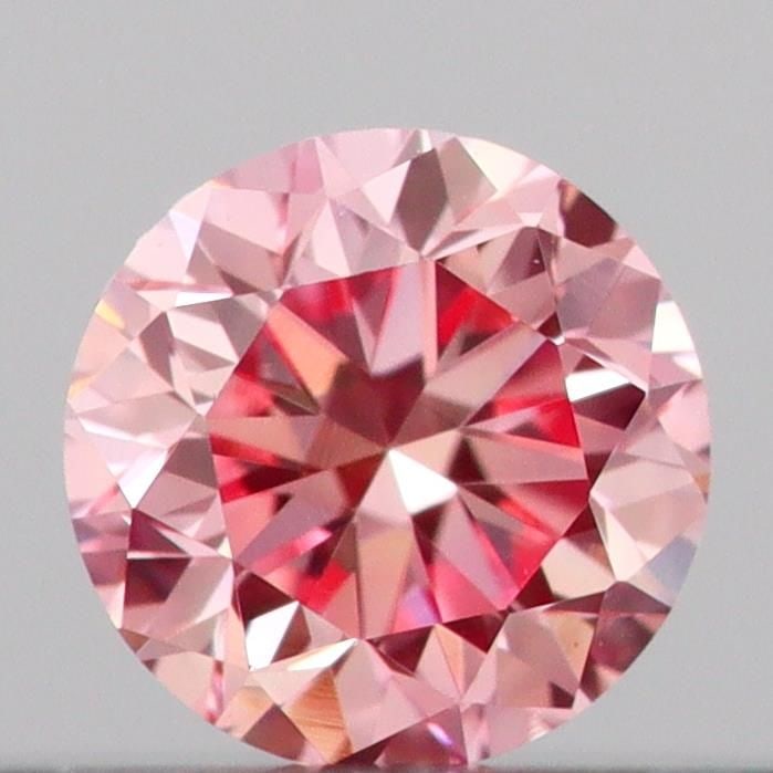 Loose Diamond - ROUND 0.16ct Fancy Vivid Pink VS1: Loose Diamond - ROUND 0.16ct Fancy Vivid Pink VS1 Source: This is a real non-mined Diamond that has been grown in a lab Shape: ROUND Carats: 0.16 Color: Fancy Vivid Pink Certification: IGI Video: