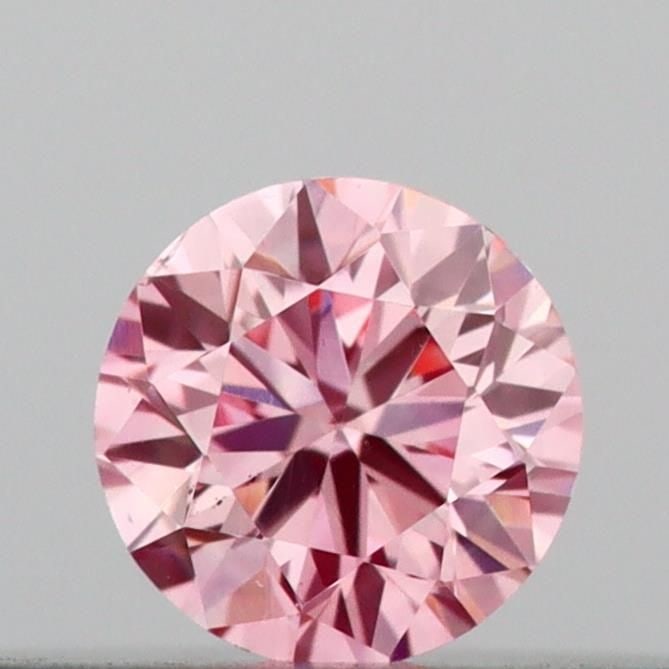 Loose Diamond - ROUND 0.12ct Fancy Vivid Pink VS1: Loose Diamond - ROUND 0.12ct Fancy Vivid Pink VS1 Source: This is a real non-mined Diamond that has been grown in a lab Shape: ROUND Carats: 0.12 Color: Fancy Vivid Pink Certification: IGI Video: