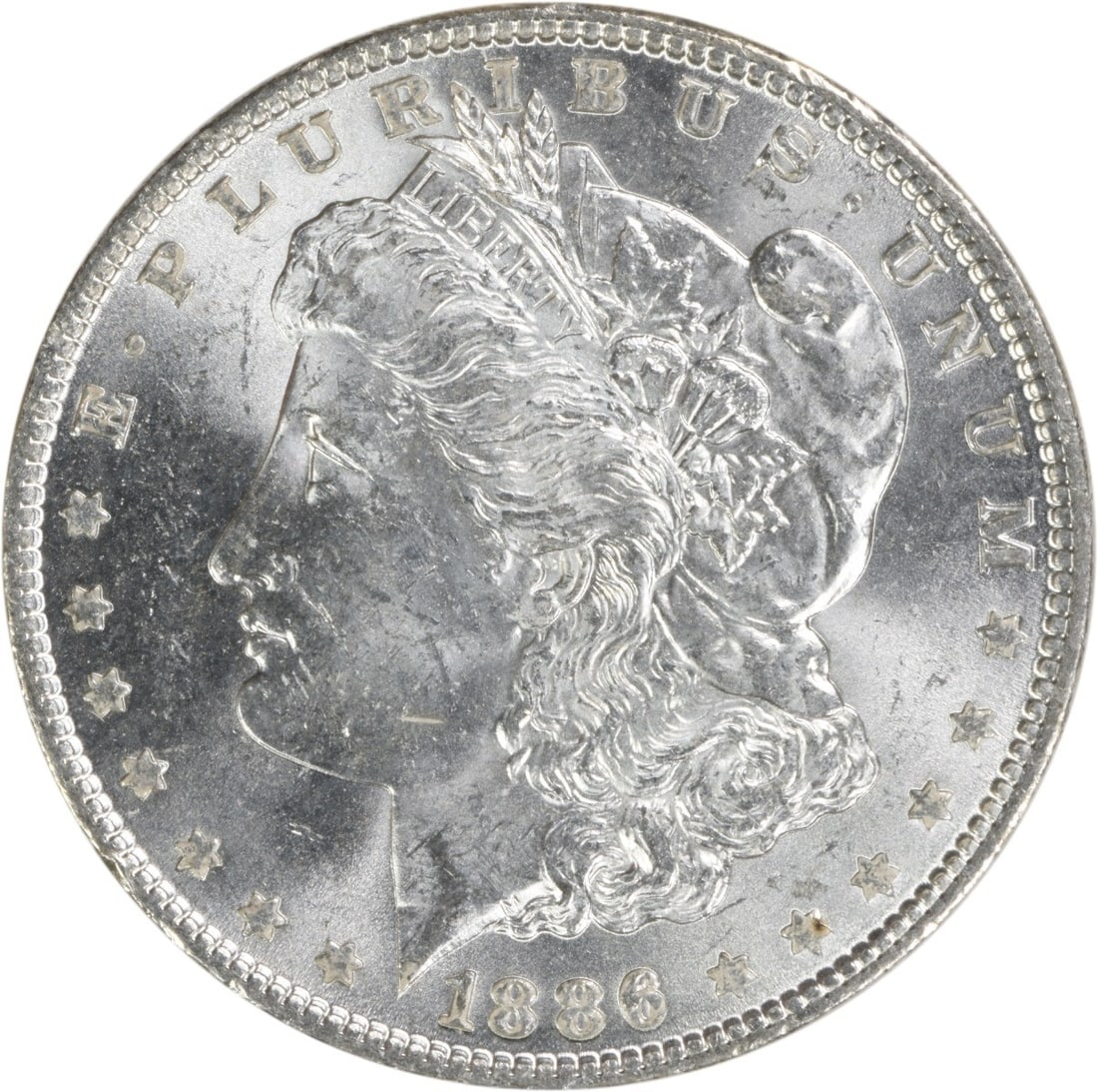 Uncirculated 1886 Silver Morgan Dollar No Mint Mark BU Grade: Uncirculated 1886 Silver Morgan Dollar No Mint Mark BU Grade This is an 1886 Morgan Silver Dollar from the United States, featuring brilliant uncirculated (BU) condition. The coin is uncertified, comp