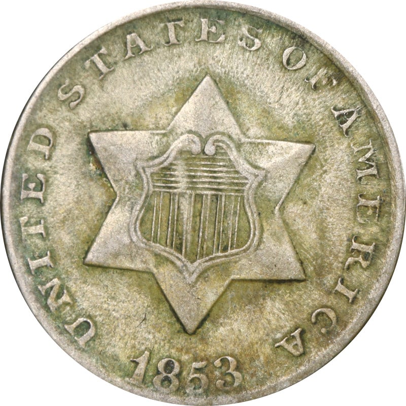 1853 Three Cent Silver Coin 90% Fineness Circulated: 1853 Three Cent Silver Coin 90% Fineness Circulated This 1853 Three Cent Silver coin is a notable piece from the mid-19th century, featuring a silver composition with a fineness of 0.9. The coin has
