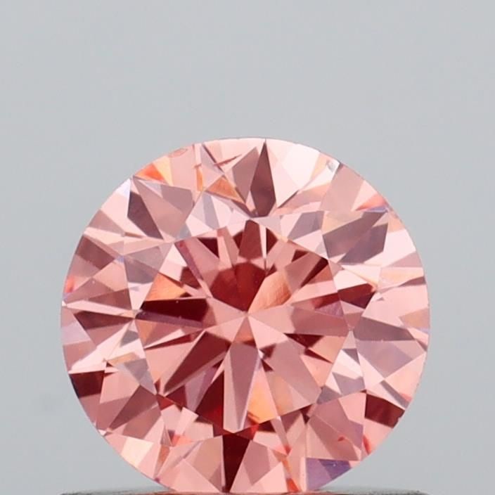 Loose Diamond - ROUND 0.62ct Fancy Intense Pink VS2: Loose Diamond - ROUND 0.62ct Fancy Intense Pink VS2 Source: This is a real non-mined Diamond that has been grown in a lab Shape: ROUND Carats: 0.62 Color: Fancy Intense Pink Certification: IGI Video: