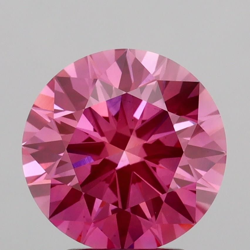 Ideal Loose Diamond - ROUND 3.08ct Fancy Vivid Pink VS1: Ideal Loose Diamond - ROUND 3.08ct Fancy Vivid Pink VS1 Source: This is a real non-mined Diamond that has been grown in a lab Shape: ROUND Carats: 3.08 Color: Fancy Vivid Pink Certification: IGI Video