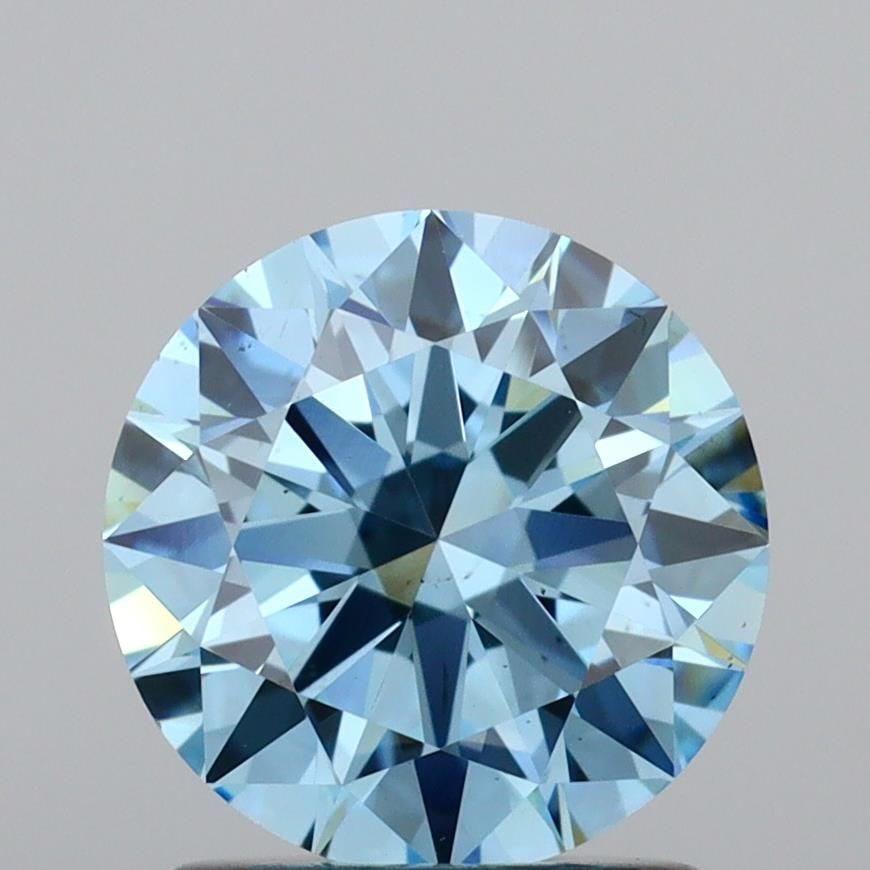 Loose Diamond - ROUND 1.4ct Fancy Vivid Blue VS1: Loose Diamond - ROUND 1.4ct Fancy Vivid Blue VS1 Source: This is a real non-mined Diamond that has been grown in a lab Shape: ROUND Carats: 1.4 Color: Fancy Vivid Blue Certification: IGI Video: Video