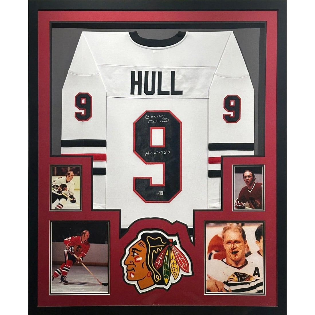 Framed Chicago Blackhawks White Jersey Signed by Bobby Hull Beckett Authenticated: Framed Chicago Blackhawks White Jersey Signed by Bobby Hull Beckett Authenticated This framed Chicago Blackhawks white jersey is autographed by Bobby Hull and authenticated by Beckett, featuring a tam