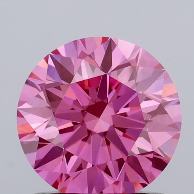 Loose Diamond - ROUND 1.07ct Fancy Vivid Pink VVS2: Loose Diamond - ROUND 1.07ct Fancy Vivid Pink VVS2 Source: This is a real non-mined Diamond that has been grown in a lab Shape: ROUND Carats: 1.07 Color: Fancy Vivid Pink Certification: IGI Video: