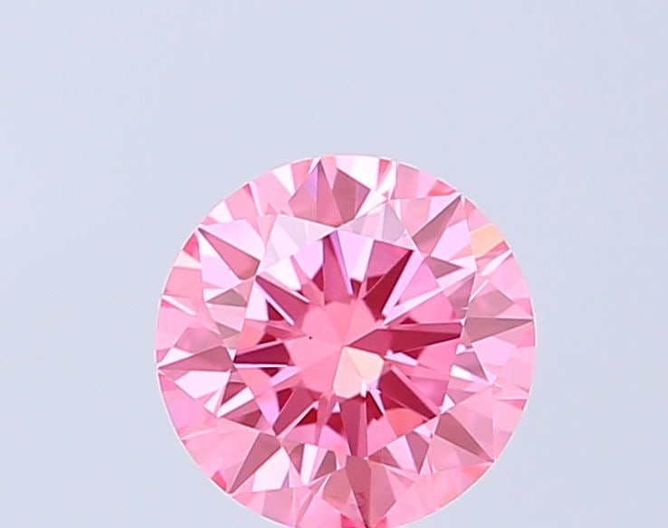 Loose Diamond - ROUND 0.9ct Fancy Vivid Pink VS1: Loose Diamond - ROUND 0.9ct Fancy Vivid Pink VS1 Source: This is a real non-mined Diamond that has been grown in a lab Shape: ROUND Carats: 0.9 Color: Fancy Vivid Pink Certification: IGI Video: Video