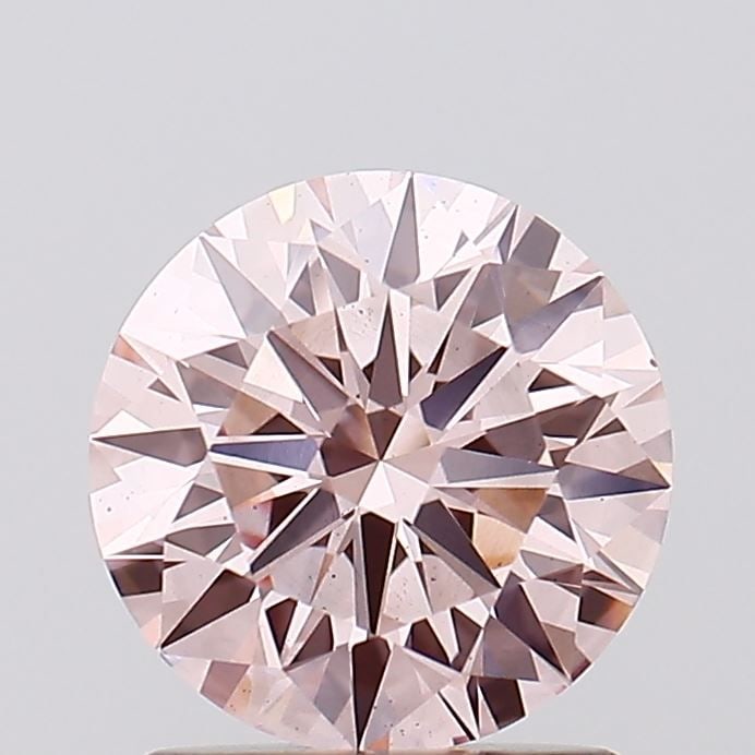Ideal Loose Diamond - ROUND 1.47ct Fancy Pink VS2: Ideal Loose Diamond - ROUND 1.47ct Fancy Pink VS2 Source: This is a real non-mined Diamond that has been grown in a lab Shape: ROUND Carats: 1.47 Color: Fancy Pink Certification: IGI Video: Video