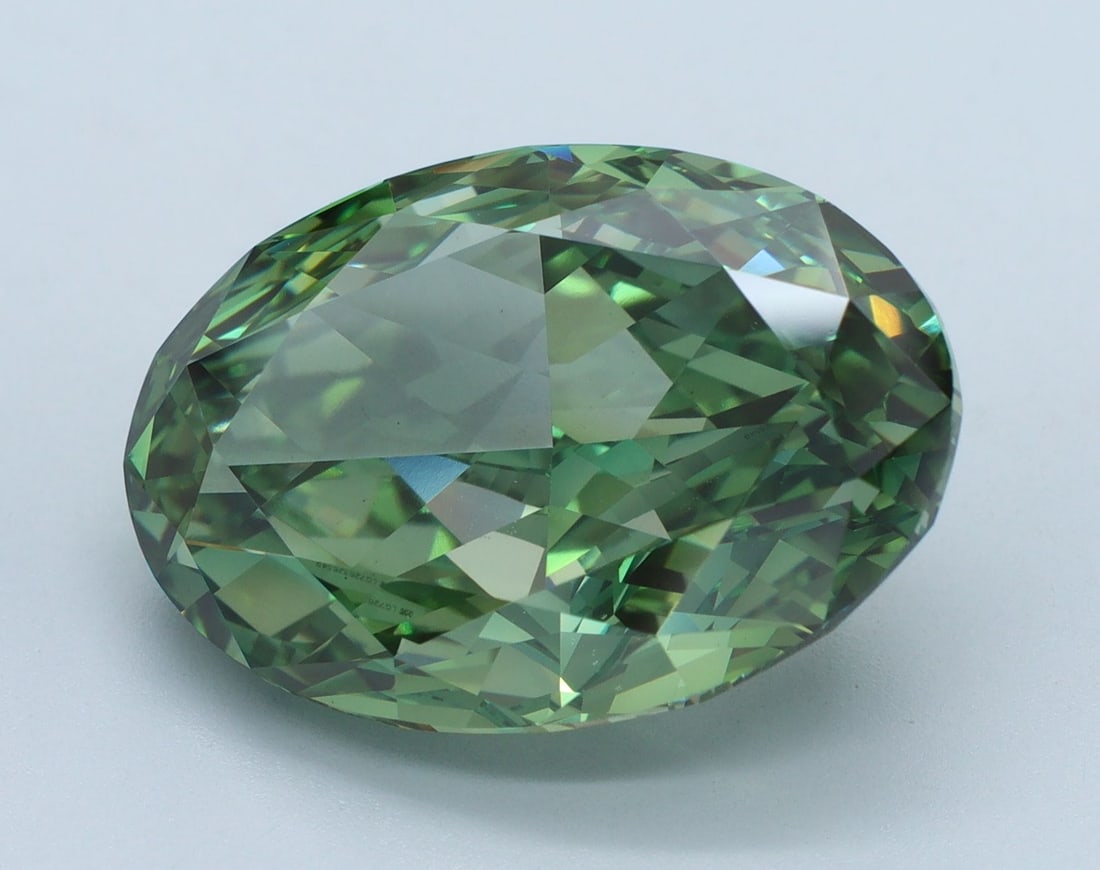 Loose Diamond - OVAL 11.71ct Fancy Vivid Green VS1: Loose Diamond - OVAL 11.71ct Fancy Vivid Green VS1 Source: This is a real non-mined Diamond that has been grown in a lab Shape: OVAL Carats: 11.71 Color: Fancy Vivid Green Certification: IGI Video: