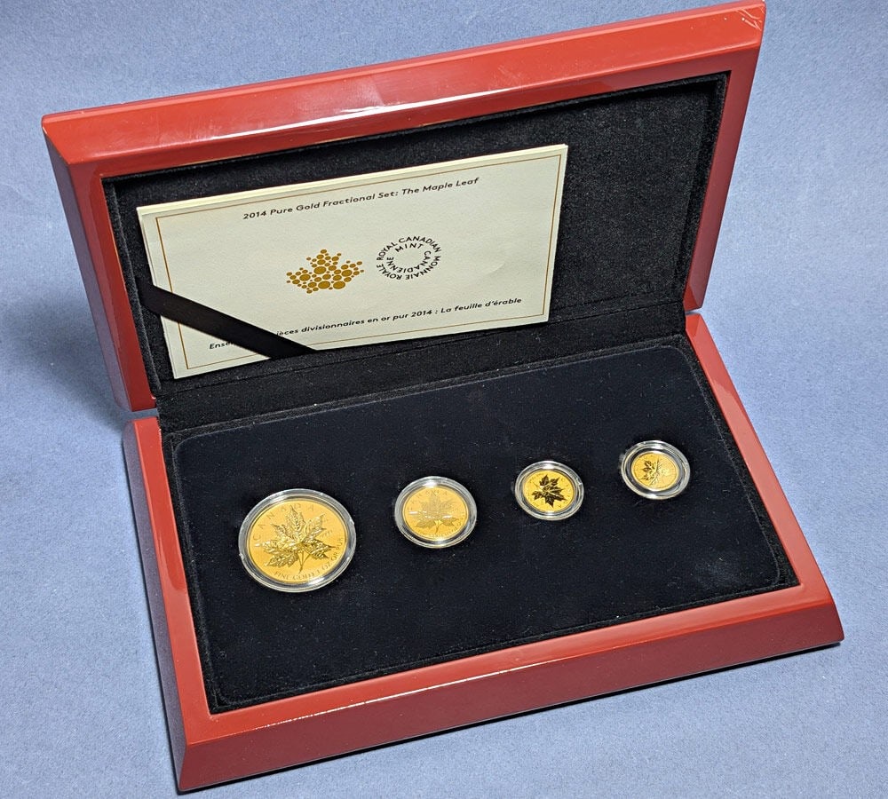 2014 Maple Leaf Reverse Proof 4 Coin Gold Fractional Set With OGP: 2014 Maple Leaf Reverse Proof 4 Coin Gold Fractional Set With OGP This is a 2014 Canada Reverse Proof Gold Fractional Set featuring the iconic Maple Leaf design. The set includes four coins with a com