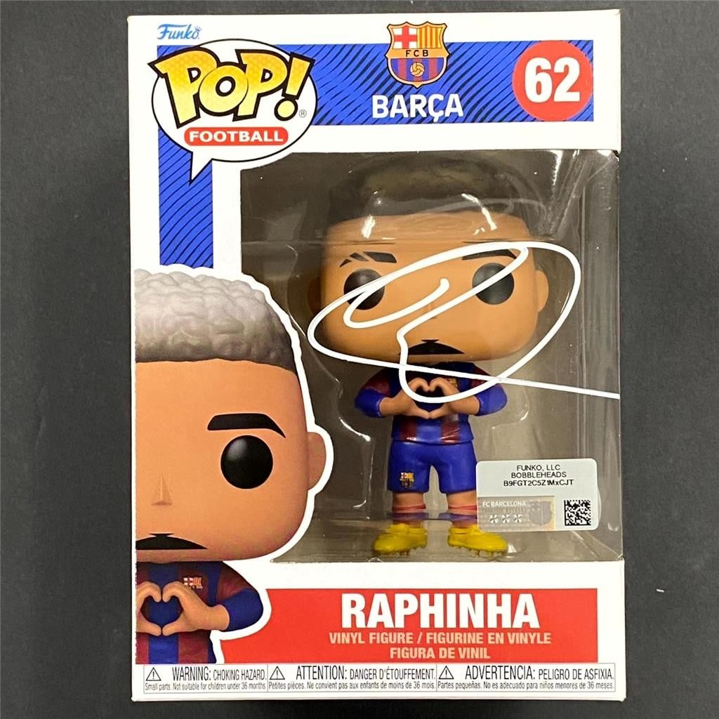 Autographed Funko Pop 62 Raphinha FC Barcelona JSA Authenticated: Autographed Funko Pop 62 Raphinha FC Barcelona JSA Authenticated This Funko Pop! 62 collectible features Raphinha, the Brazilian soccer star, in his FC Barcelona kit. The item is hand-signed by Raphin