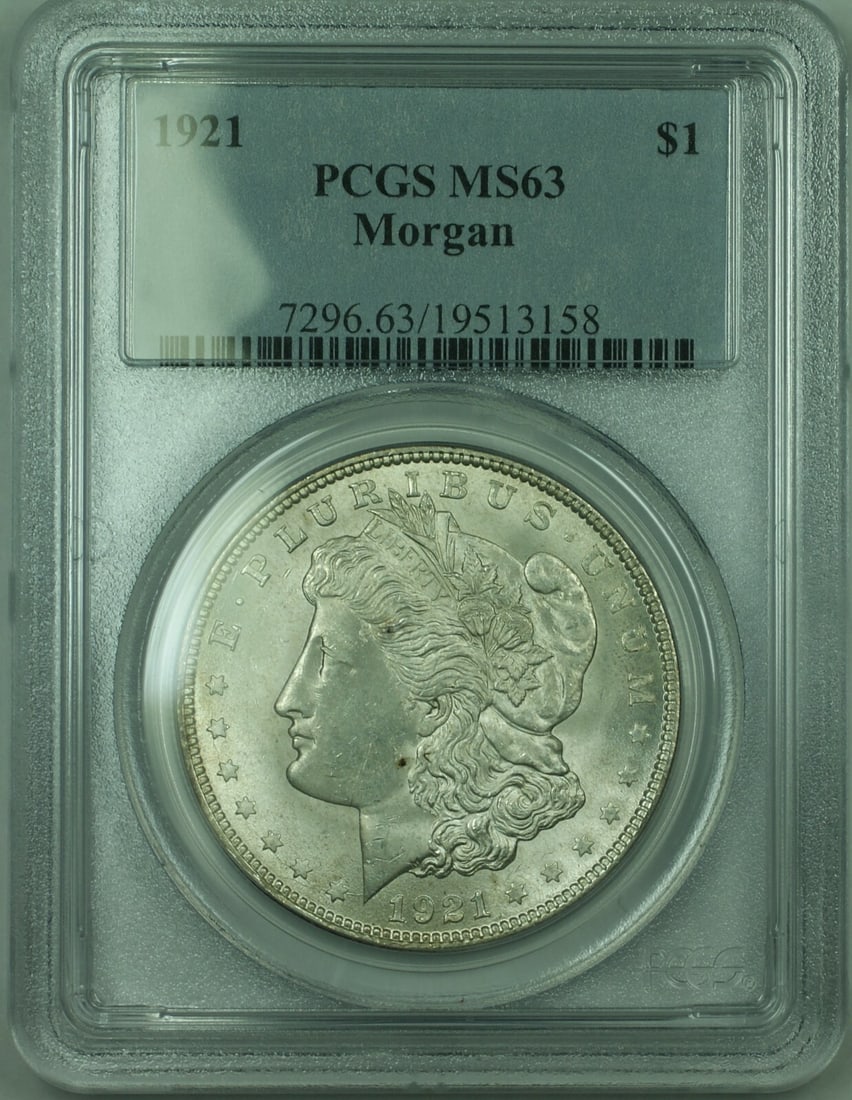 1921 Morgan Dollar Silver $1 PCGS MS63 Certified Coin: 1921 Morgan Dollar Silver $1 PCGS MS63 Certified Coin This is a 1921 Morgan Silver Dollar $1 coin from the United States, graded MS-63 by PCGS. The coin is uncirculated and composed of 90% silver,
