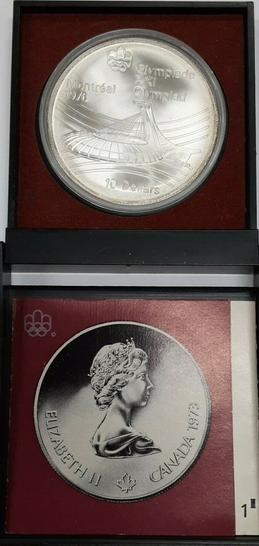 1976 Montreal Olympics $10 Silver Commemorative Coin in RCM Case with COA: 1976 Montreal Olympics $10 Silver Commemorative Coin in RCM Case with COA This 1976 Canada RCM 10 Dollar silver coin commemorates the Montreal Olympic Games. Struck in 0.925 fine silver, the uncircula