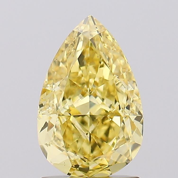 Loose Diamond - PEAR 1.56ct Fancy Vivid Yellow VS1: Loose Diamond - PEAR 1.56ct Fancy Vivid Yellow VS1 Source: This is a real non-mined Diamond that has been grown in a lab Shape: PEAR Carats: 1.56 Color: Fancy Vivid Yellow Certification: IGI Video: