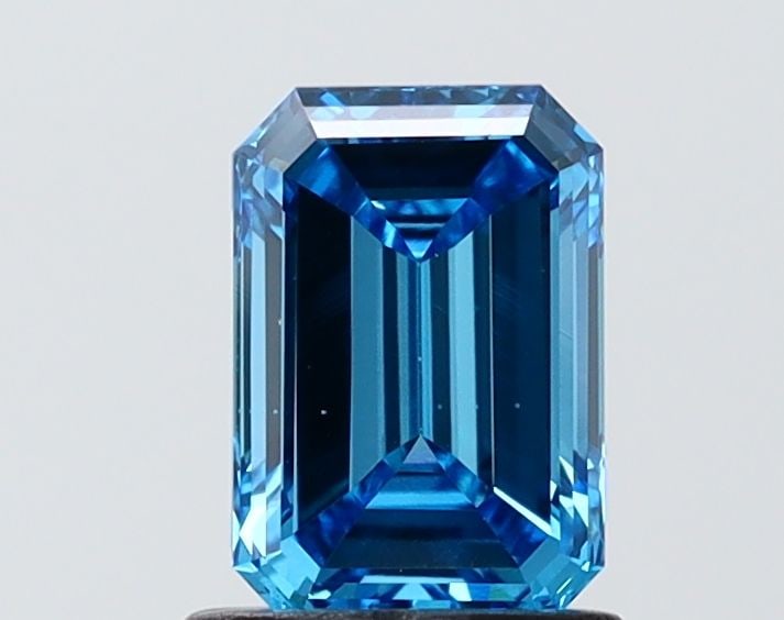 Loose Diamond - EMERALD 1.05ct Fancy Vivid Blue VS2: Loose Diamond - EMERALD 1.05ct Fancy Vivid Blue VS2 Source: This is a real non-mined Diamond that has been grown in a lab Shape: EMERALD Carats: 1.05 Color: Fancy Vivid Blue Certification: IGI Video: