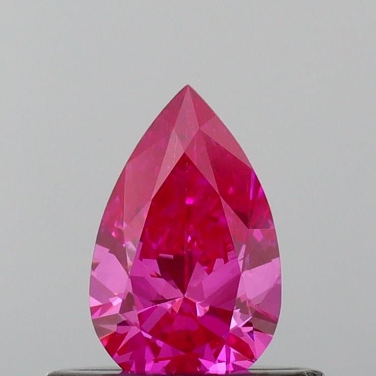 Loose Diamond - PEAR 0.4ct Fancy Vivid Pink VS1: Loose Diamond - PEAR 0.4ct Fancy Vivid Pink VS1 Source: This is a real non-mined Diamond that has been grown in a lab Shape: PEAR Carats: 0.4 Color: Fancy Vivid Pink Certification: IGI Video: Video