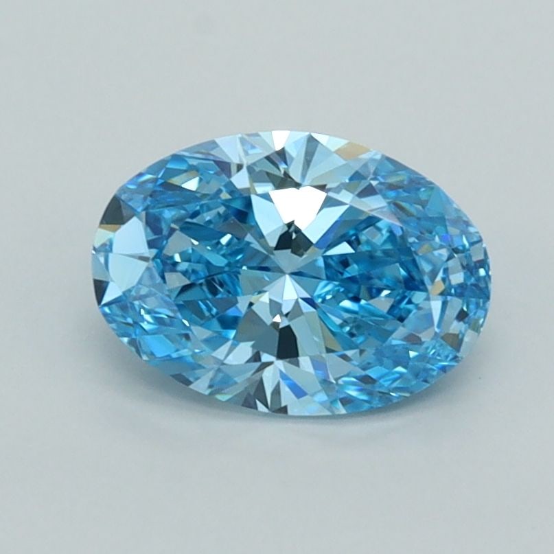 Loose Diamond - OVAL 1.02ct Fancy Vivid Blue VVS1: Loose Diamond - OVAL 1.02ct Fancy Vivid Blue VVS1 Source: This is a real non-mined Diamond that has been grown in a lab Shape: OVAL Carats: 1.02 Color: Fancy Vivid Blue Certification: IGI Video: