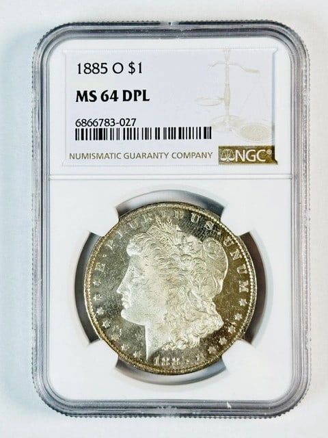 1885-O NGC MS64 DPL Morgan Dollar Silver Cameo Look: 1885-O NGC MS64 DPL Morgan Dollar Silver Cameo Look This 1885 Morgan Silver Dollar was minted in New Orleans and has been certified by NGC with a grade of MS-64 DPL, indicating a deep prooflike surfac