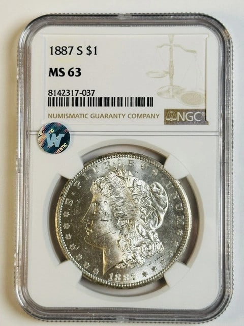 1887-S NGC MS63 Morgan Dollar PL Reverse Sight White: 1887-S NGC MS63 Morgan Dollar PL Reverse Sight White This 1887 Morgan Silver Dollar features a San Francisco mint mark and is certified by NGC with a grade of MS-63. The coin is composed of silver and