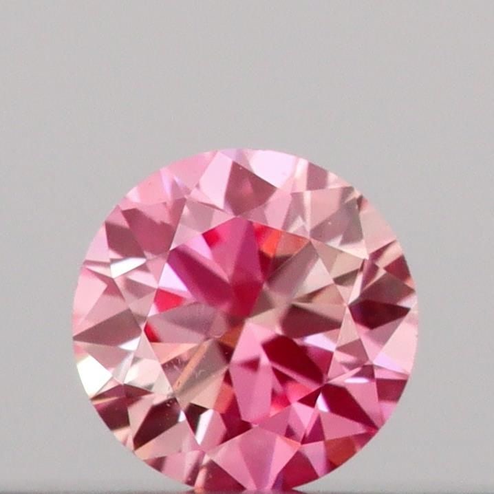 Loose Diamond - ROUND 0.09ct Fancy Vivid Pink VS1: Loose Diamond - ROUND 0.09ct Fancy Vivid Pink VS1 Source: This is a real non-mined Diamond that has been grown in a lab Shape: ROUND Carats: 0.09 Color: Fancy Vivid Pink Certification: IGI Video: