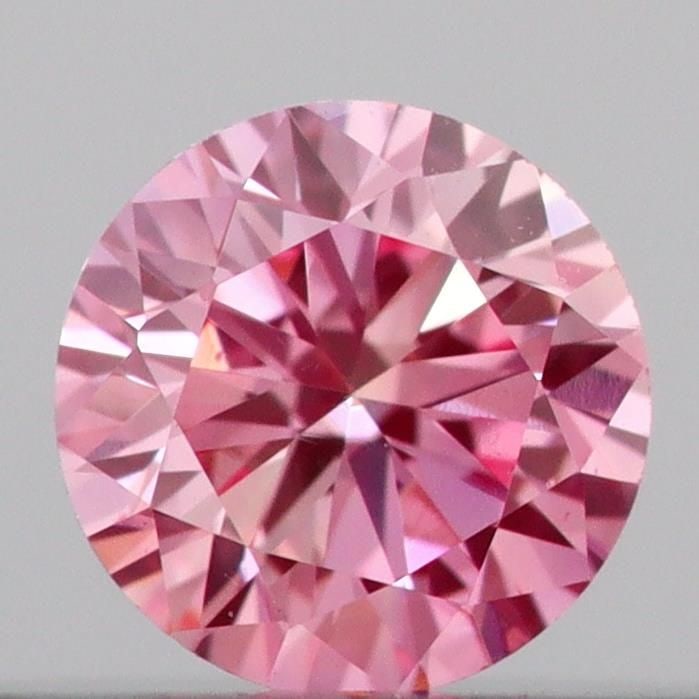 Loose Diamond - ROUND 0.16ct Fancy Vivid Pink VS1: Loose Diamond - ROUND 0.16ct Fancy Vivid Pink VS1 Source: This is a real non-mined Diamond that has been grown in a lab Shape: ROUND Carats: 0.16 Color: Fancy Vivid Pink Certification: IGI Video: