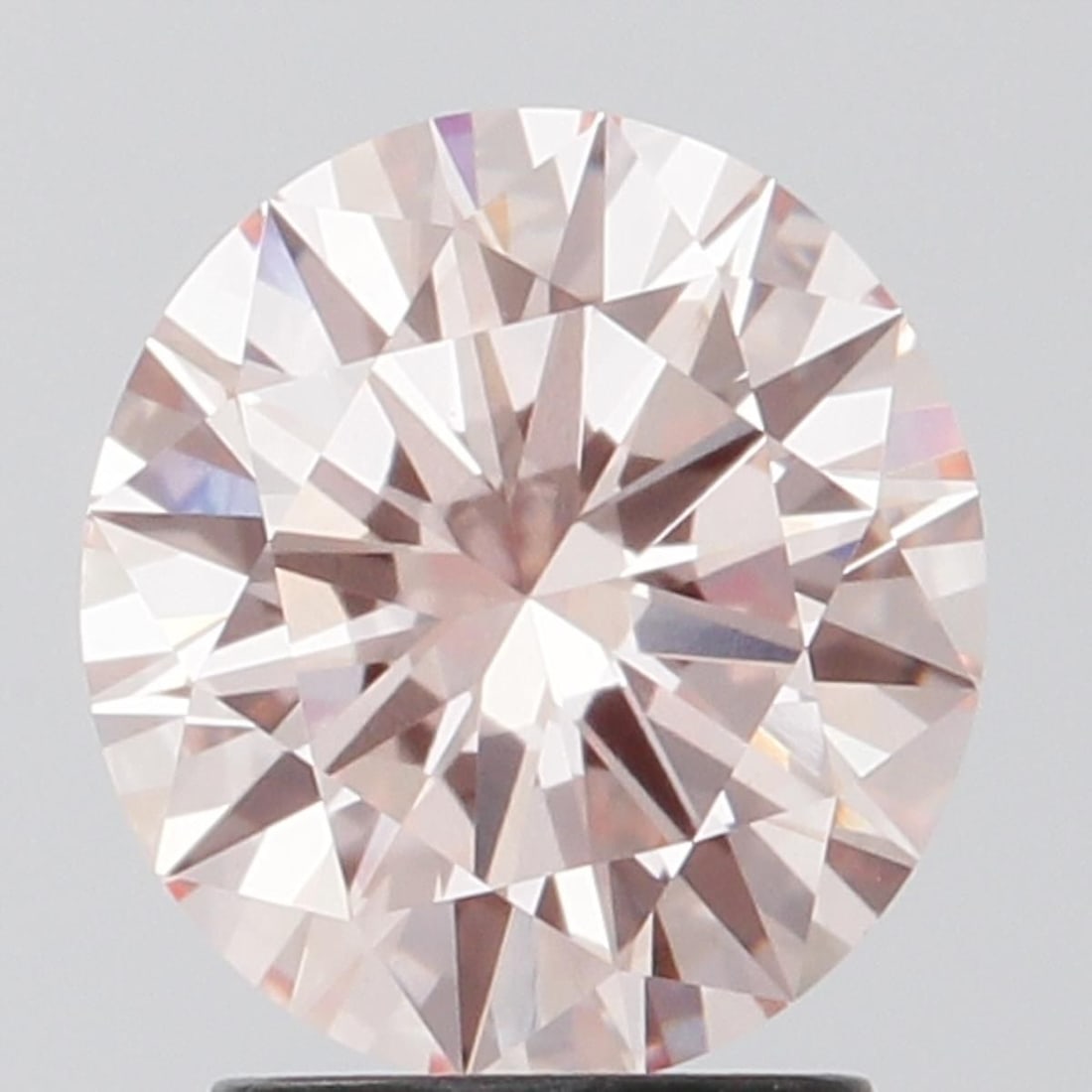 Loose Diamond - ROUND 2.0ct Fancy Intense Pink VS1: Loose Diamond - ROUND 2.0ct Fancy Intense Pink VS1 Source: This is a real non-mined Diamond that has been grown in a lab Shape: ROUND Carats: 2.0 Color: Fancy Intense Pink Certification: IGI Video: