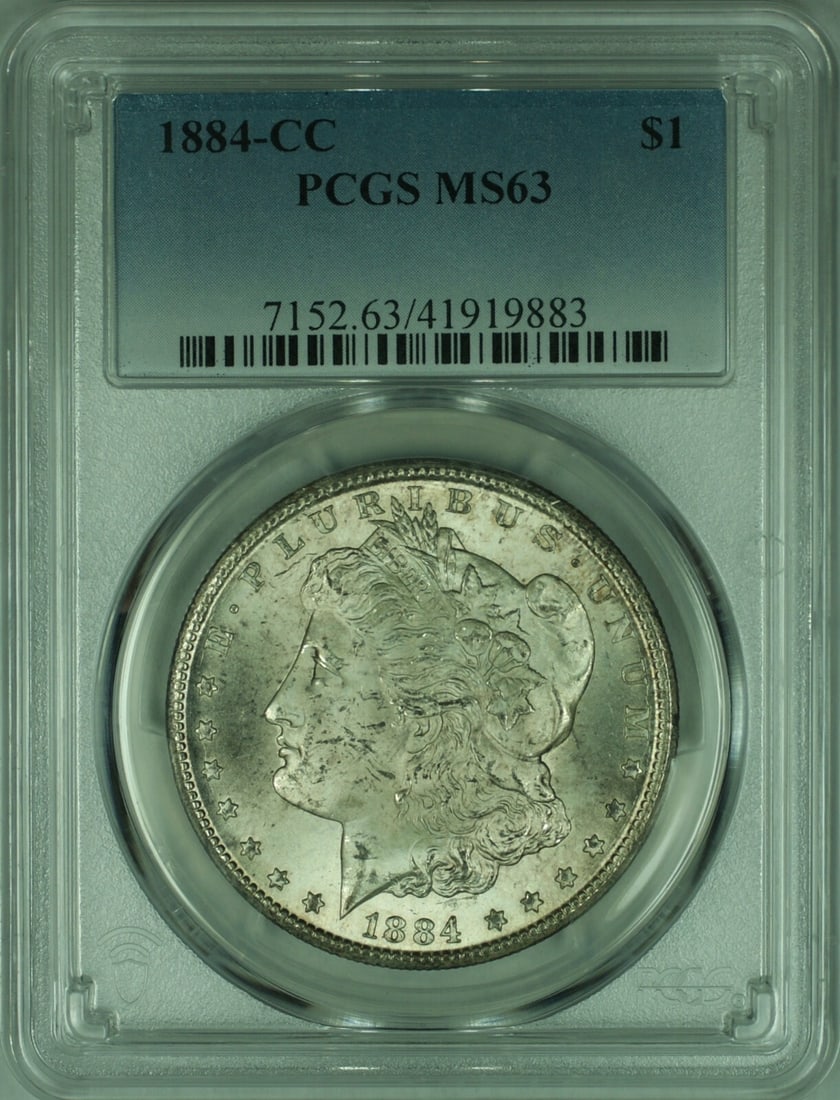 PCGS MS-63 1884-CC Carson City Morgan Silver Dollar $1 Coin: PCGS MS-63 1884-CC Carson City Morgan Silver Dollar $1 Coin This 1884-CC Morgan Silver Dollar is certified by PCGS with a grade of MS-63. Struck at the Carson City Mint, this uncirculated coin feature