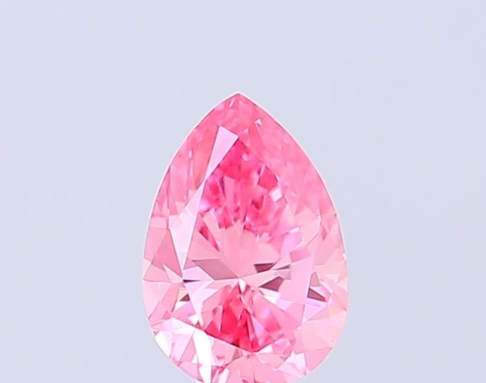 Loose Diamond - PEAR 0.57ct Fancy Vivid Pink VVS2: Loose Diamond - PEAR 0.57ct Fancy Vivid Pink VVS2 Source: This is a real non-mined Diamond that has been grown in a lab Shape: PEAR Carats: 0.57 Color: Fancy Vivid Pink Certification: IGI Video: