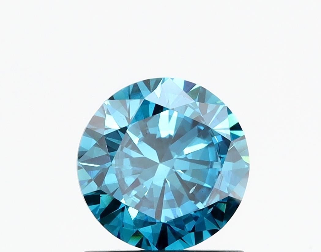 Loose Diamond - ROUND 0.98ct Fancy Blue SI1: Loose Diamond - ROUND 0.98ct Fancy Blue SI1 Source: This is a real non-mined Diamond that has been grown in a lab Shape: ROUND Carats: 0.98 Color: Fancy Blue Certification: NONE Video:
