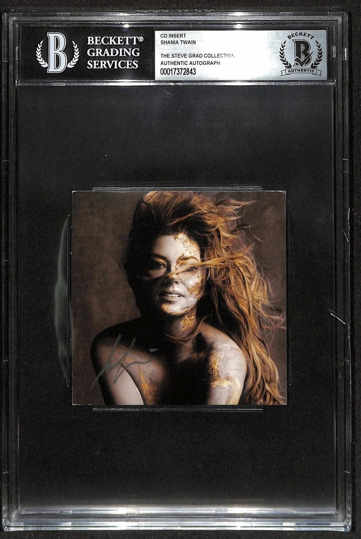 Shania Twain Queen of Me Signed CD Insert Beckett Authenticated: Shania Twain Queen of Me Signed CD Insert Beckett Authenticated This item features an autographed insert of Shania Twain's 'Queen of Me' CD, signed in silver permanent marker. The signature has been a