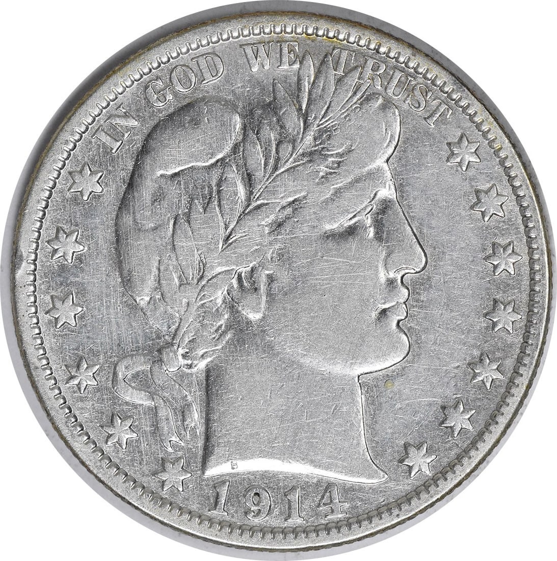 1914-S Barber Half Dollar 50C Silver Coin by Charles E Barber: 1914-S Barber Half Dollar 50C Silver Coin by Charles E Barber This 1914-S Barber Silver Half Dollar is a remarkable piece of numismatic history. It features a beautiful design by Charles E. Barber and