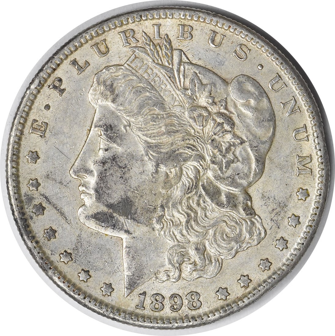 1898-S Morgan Silver Dollar AU Uncertified San Francisco Mint: 1898-S Morgan Silver Dollar AU Uncertified San Francisco Mint This 1898-S Morgan Silver Dollar is a stunning piece of American numismatic history. It features a composition of 90% silver and 10% coppe