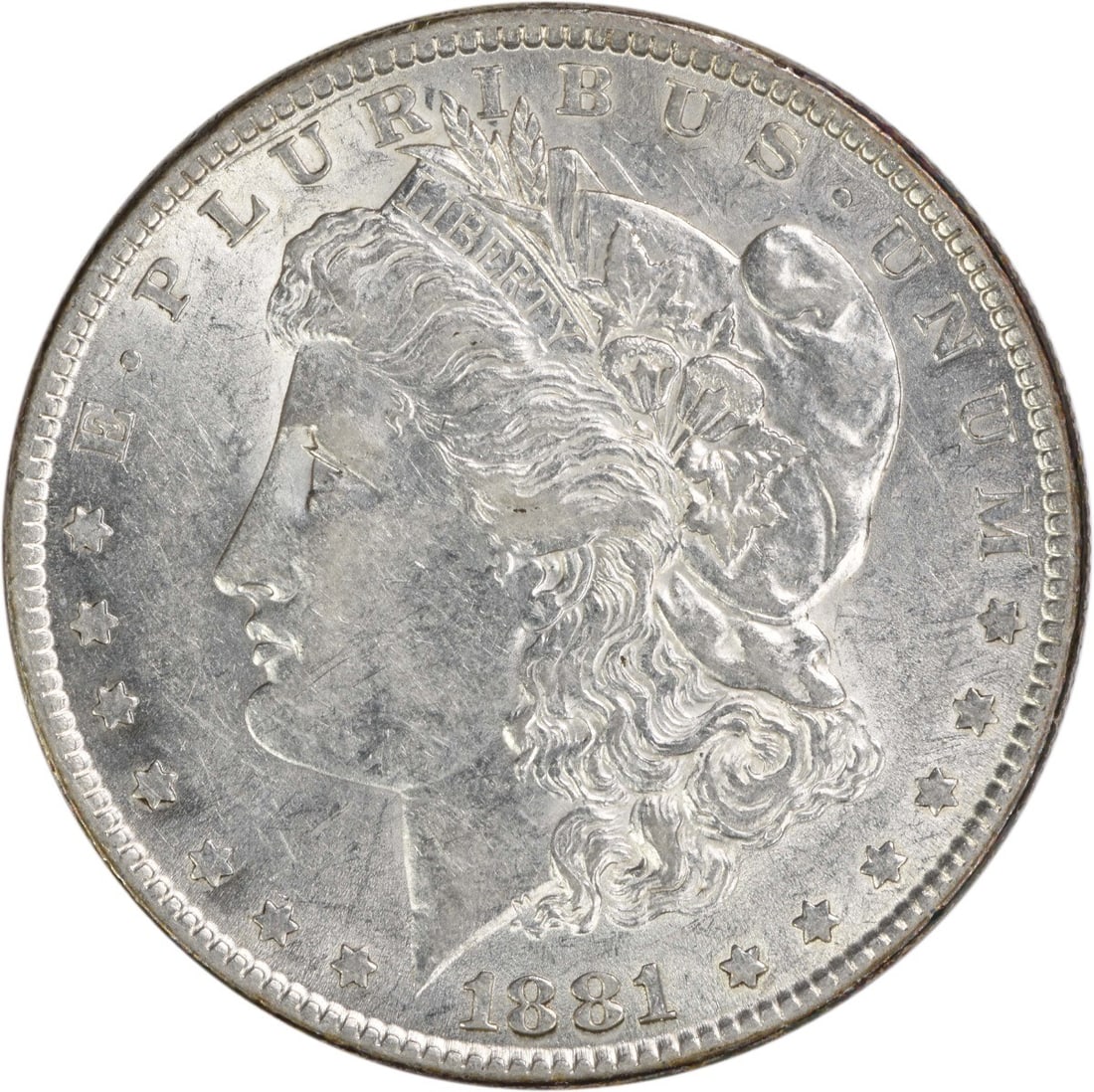 1881 United States Morgan Dollar 90 Percent Silver AU Condition Uncertified: 1881 United States Morgan Dollar 90 Percent Silver AU Condition Uncertified This 1881 Morgan Silver Dollar was minted in Philadelphia and features a composition of 90% silver and 10% copper. Designed 