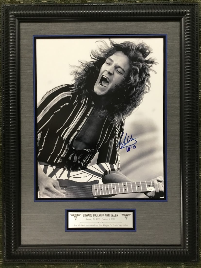 Eddie Van Halen Signed 16x20 Photo Framed Display with JSA Authentication: Eddie Van Halen Signed 16x20 Photo Framed Display with JSA Authentication This custom framed display features a stunning 16x20 photograph signed by the legendary guitarist Eddie Van Halen. It showcase