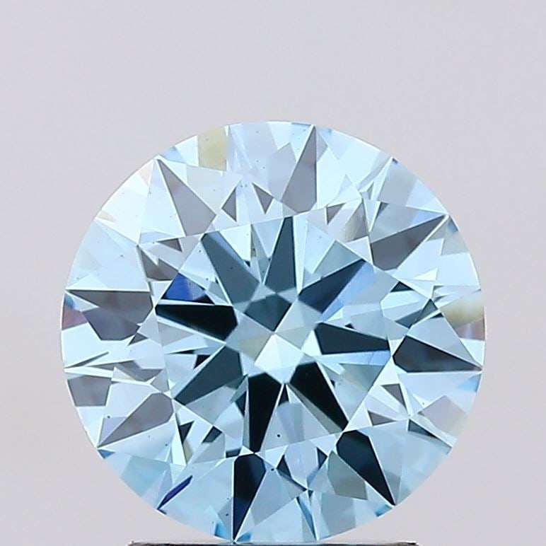 Ideal Loose Diamond - ROUND 2.02ct Fancy Vivid Blue VS1: Ideal Loose Diamond - ROUND 2.02ct Fancy Vivid Blue VS1 Source: This is a real non-mined Diamond that has been grown in a lab Shape: ROUND Carats: 2.02 Color: Fancy Vivid Blue Certification: IGI