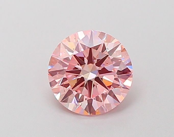 Ideal Loose Diamond - ROUND 0.91ct Fancy Intense Pink VS2: Ideal Loose Diamond - ROUND 0.91ct Fancy Intense Pink VS2 Source: This is a real non-mined Diamond that has been grown in a lab Shape: ROUND Carats: 0.91 Color: Fancy Intense Pink Certification: IGI V