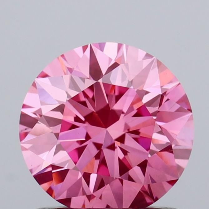 Loose Diamond - ROUND 1.01ct Fancy Vivid Pink VS2: Loose Diamond - ROUND 1.01ct Fancy Vivid Pink VS2 Source: This is a real non-mined Diamond that has been grown in a lab Shape: ROUND Carats: 1.01 Color: Fancy Vivid Pink Certification: IGI Video: