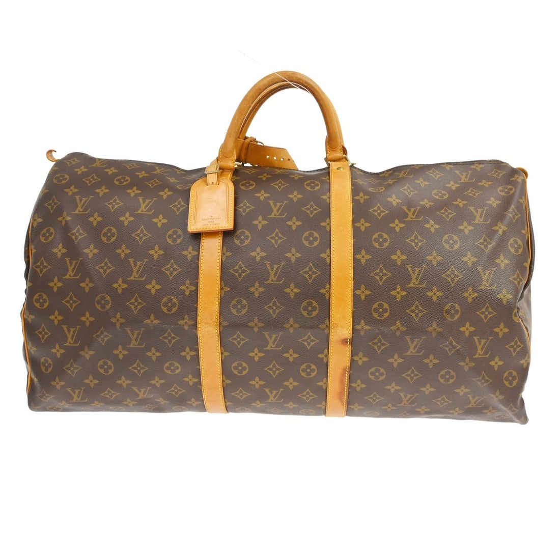 Louis Vuitton Keepall Monogram Canvas Travel Duffel 60cm: Louis Vuitton Keepall Monogram Canvas Travel Duffel 60cm This Louis Vuitton Keepall Bag features the iconic Monogram canvas and is designed for unisex use. The bag is brown and crafted from durable ca