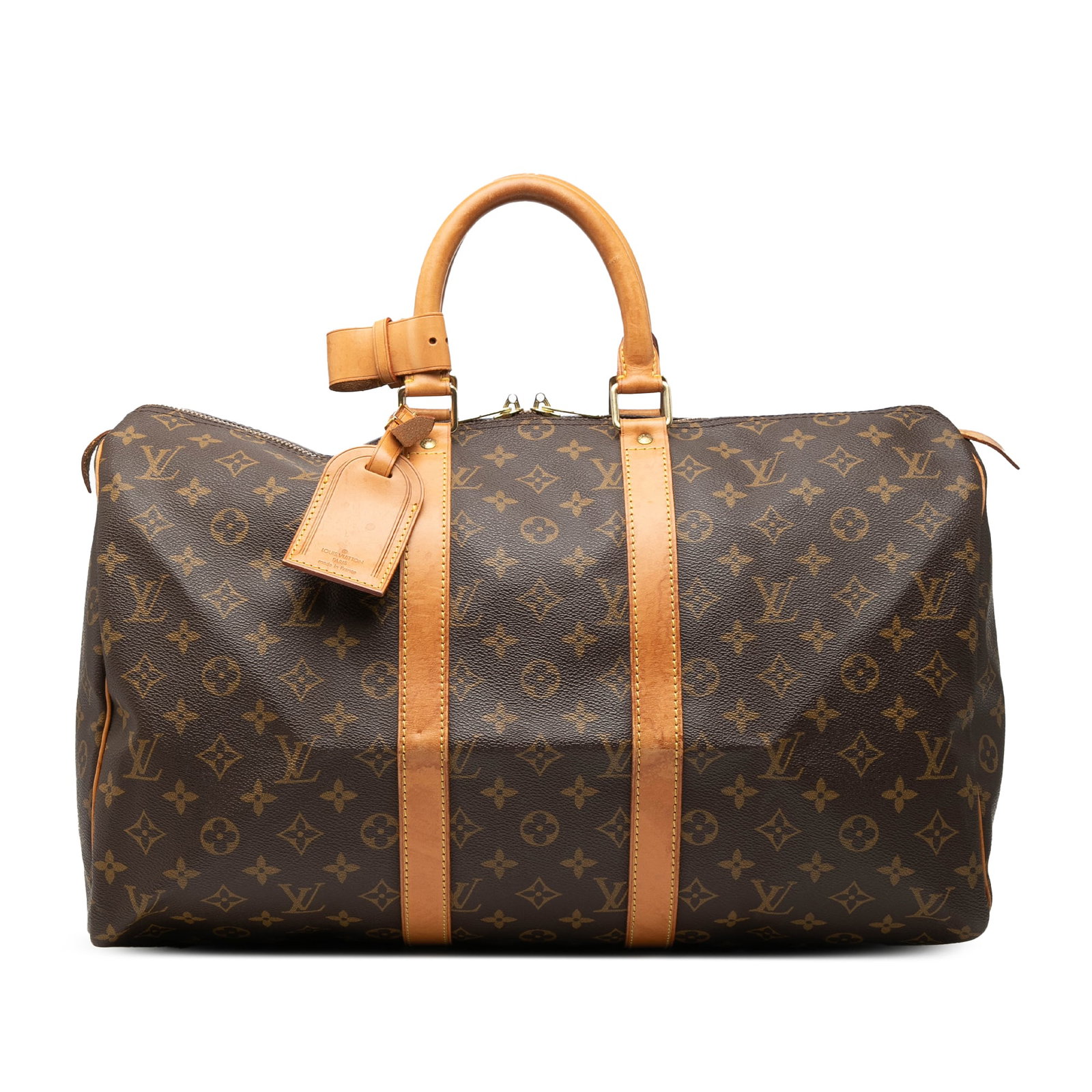 Louis Vuitton Keepall 45 Travel Bag Monogram Canvas with Vachetta Leather Trim: Louis Vuitton Keepall 45 Travel Bag Monogram Canvas with Vachetta Leather Trim The Louis Vuitton Monogram Keepall 45 is crafted from iconic monogram canvas with vachetta leather trim and rolled vachet