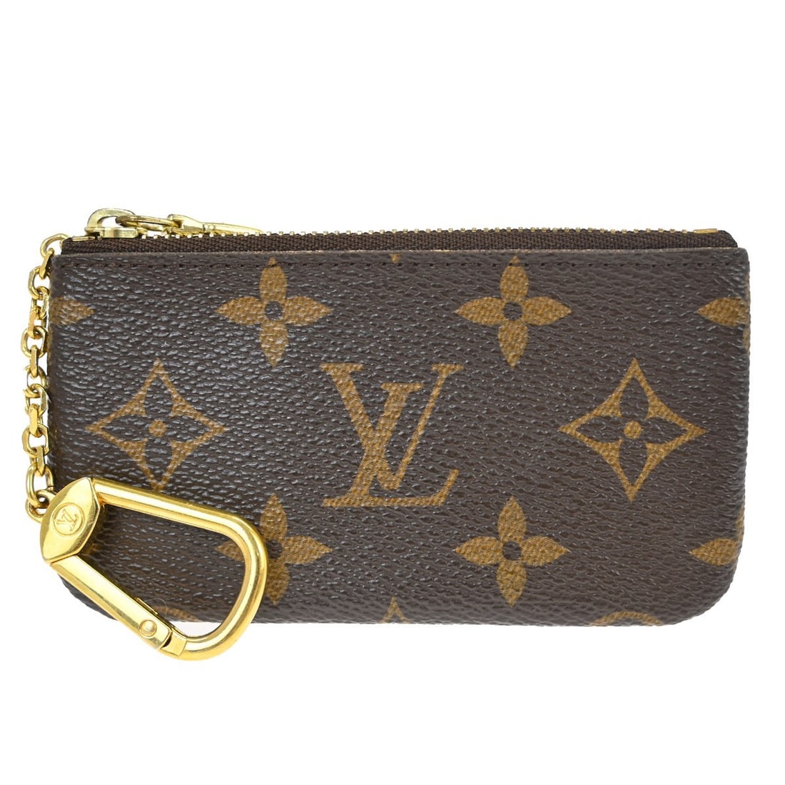 Louis Vuitton Monogram Coin Wallet M62650 Vintage: Louis Vuitton Monogram Coin Wallet M62650 Vintage This Louis Vuitton Monogram Pochette Cles coin purse is crafted from leather in the signature brown monogram pattern. Designed as a vintage piece, it 